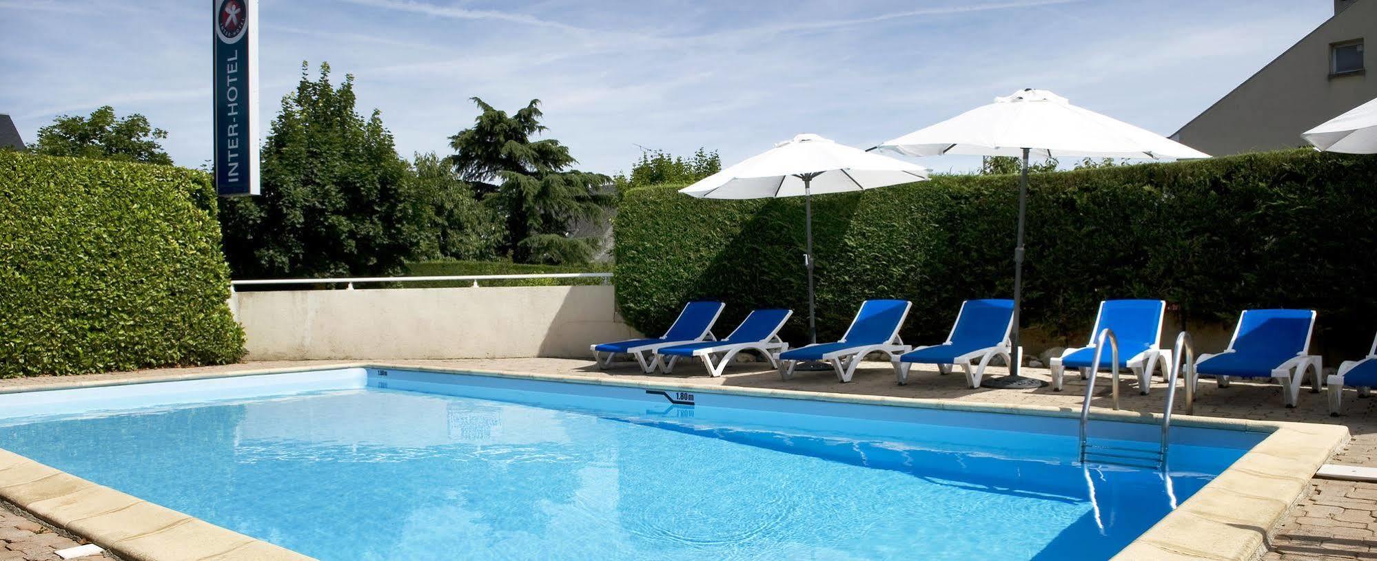Hotel Les Peyrieres Olemps Bagian luar foto